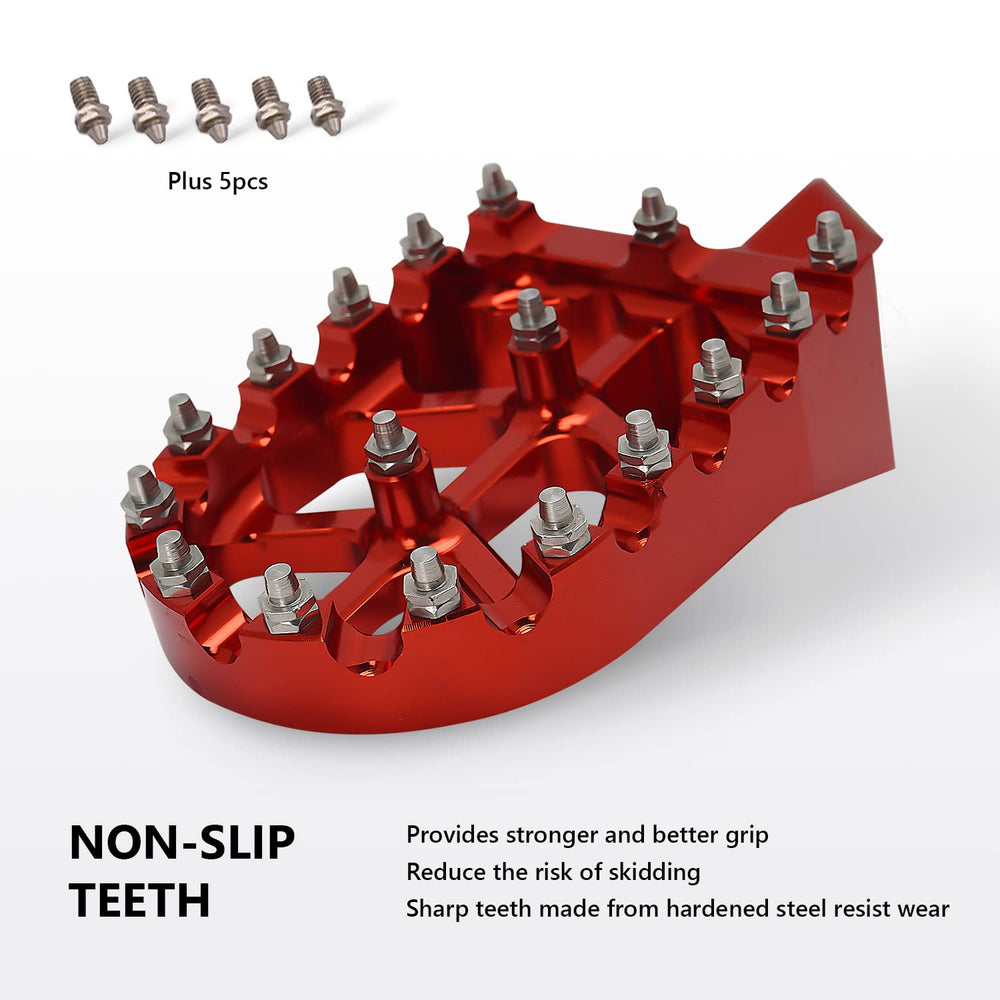 AnXin foot pegs next to hand for scale showing compact durable size