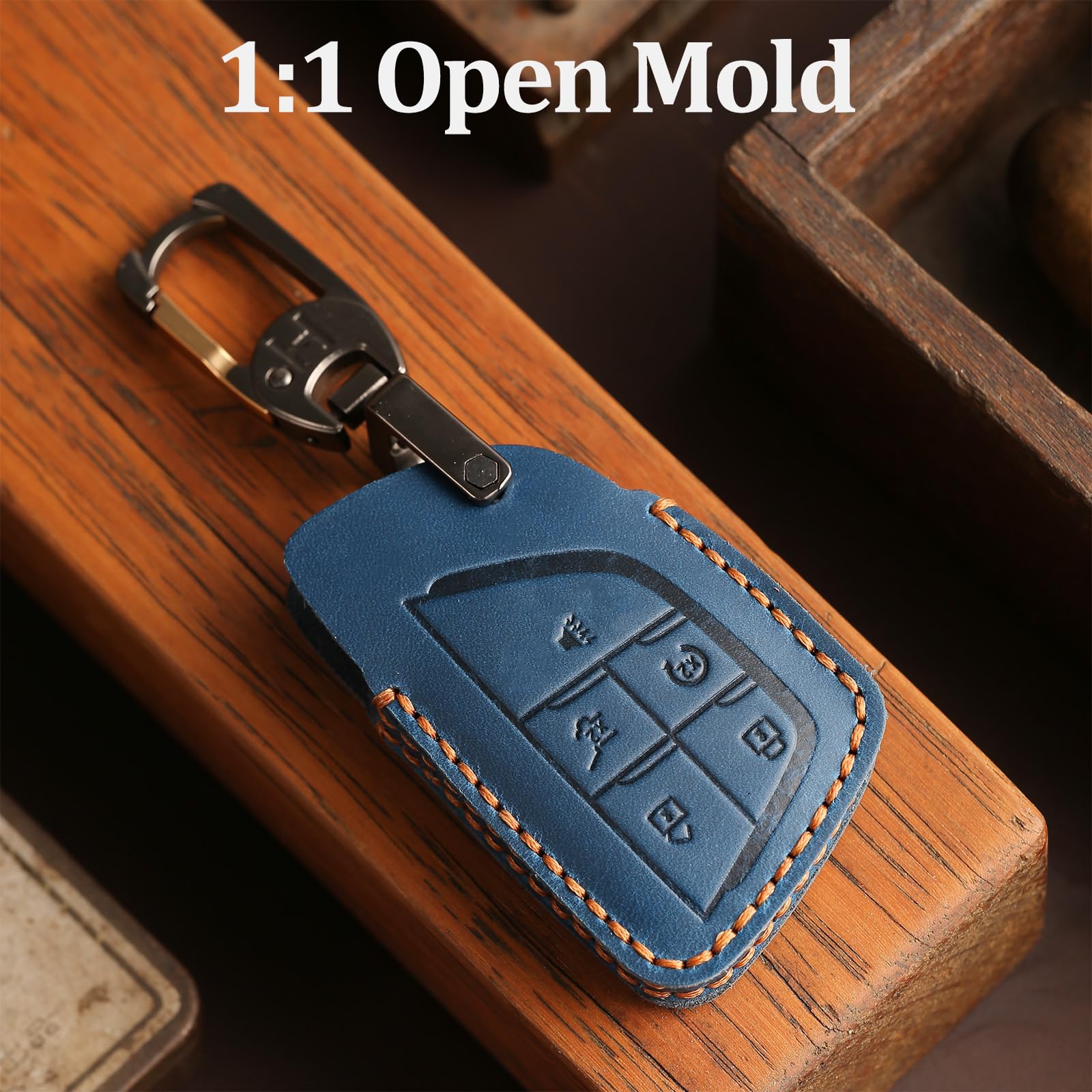 Aoocar leather key fob cover held in hand showing compact size and grip