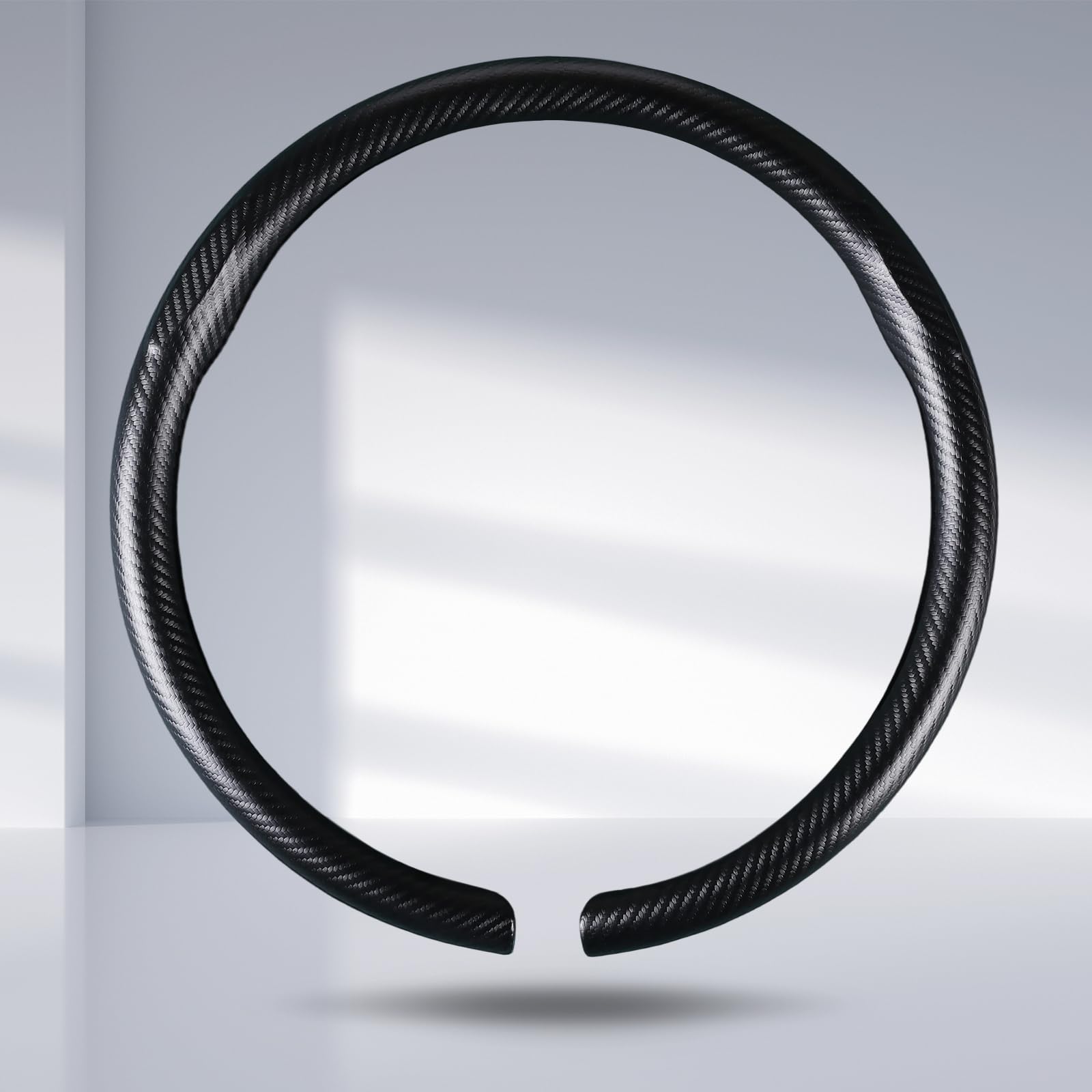 Aotoyou steering wheel cover front view showing matte black style and sporty look