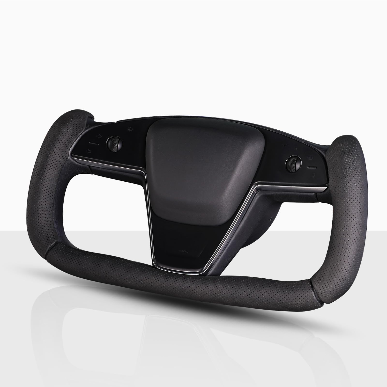 Aotoyou front view on Tesla yoke showing sleek black fit and improved control