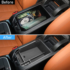 APESER installed in X3 armrest showing organized storage and accessibility