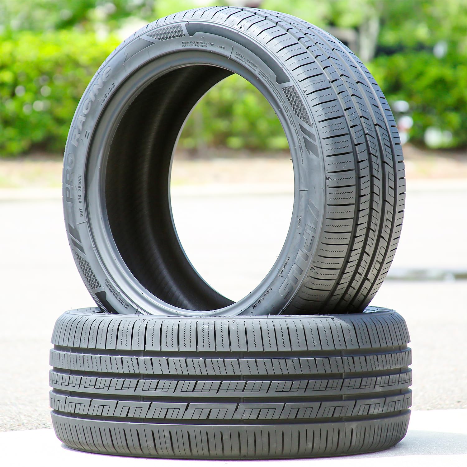 Aplus Pro Racing tire in motion on track showing stable high-speed performance