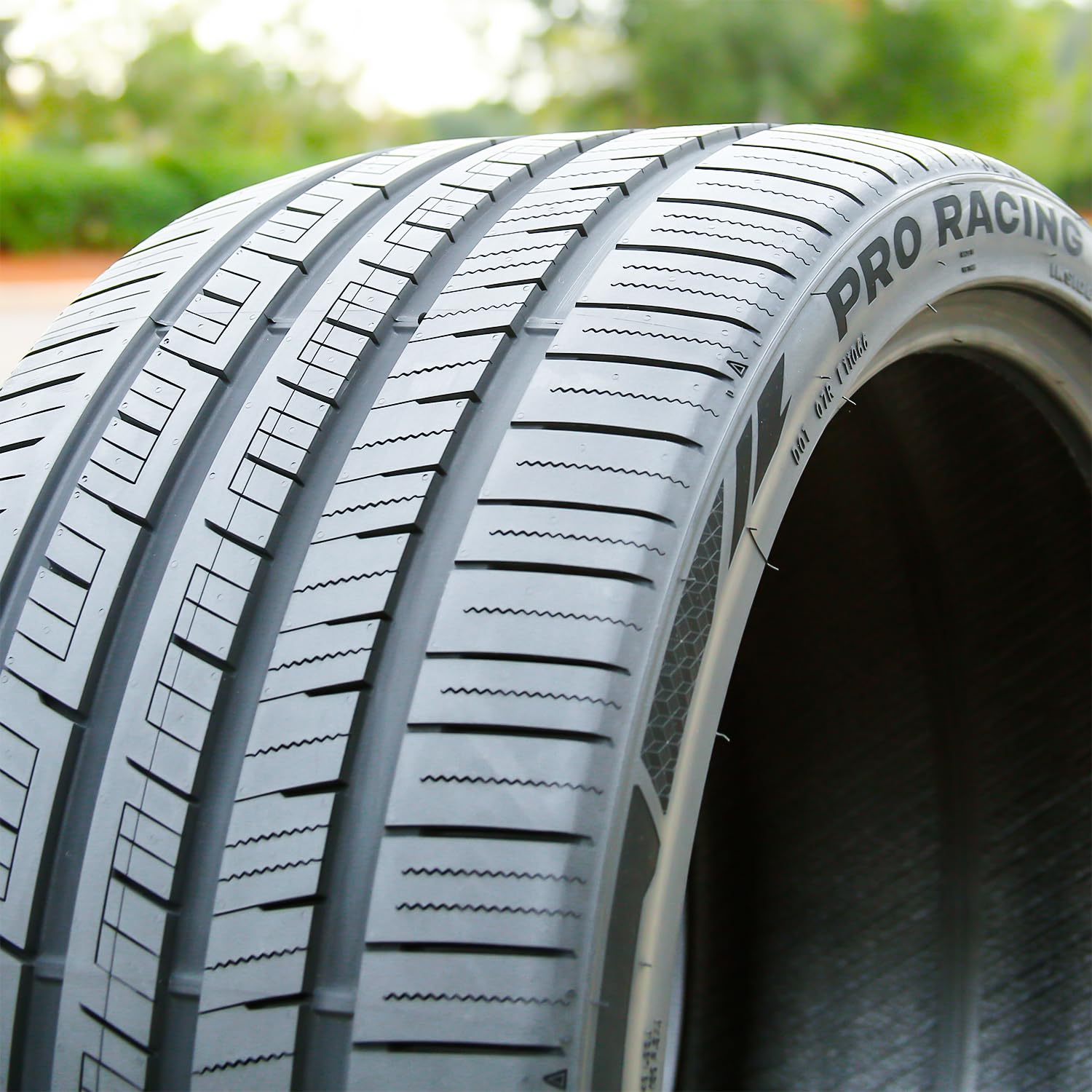Aplus tread close-up showing semi-slick pattern for superior dry grip