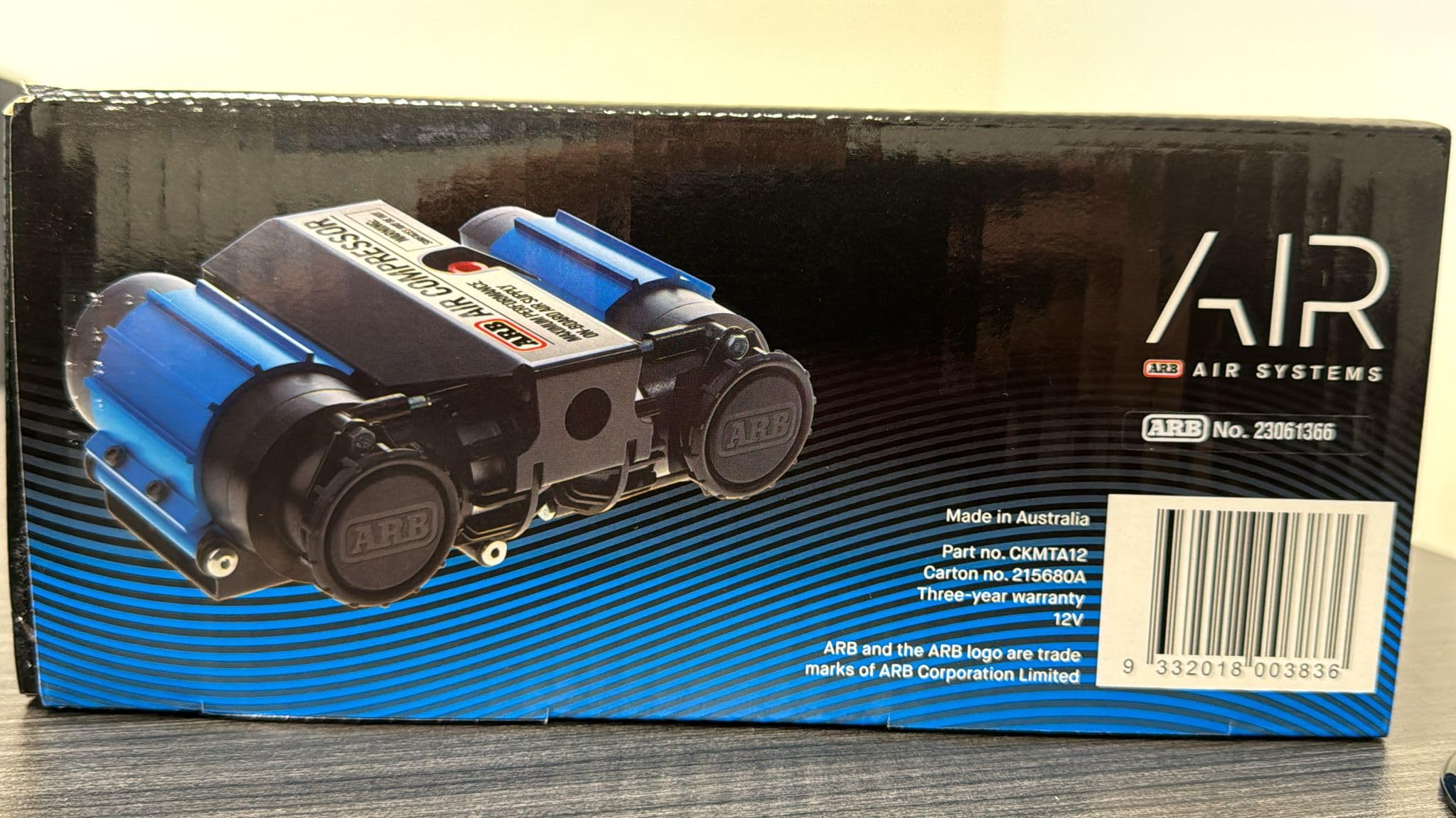 ARB compressor next to ruler illustrating compact 12V size and portability