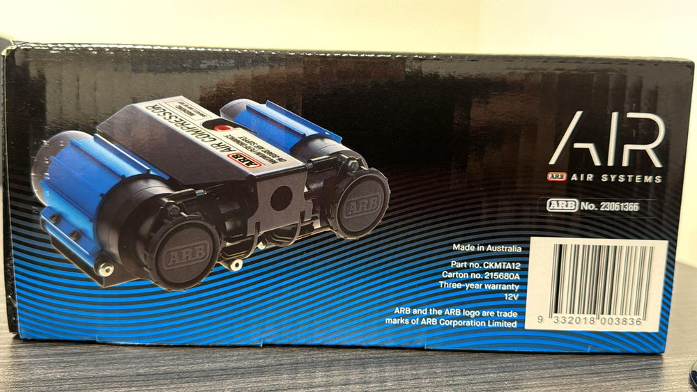 ARB compressor next to ruler illustrating compact 12V size and portability