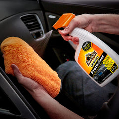 Armor All being applied to a dashboard showing cleaning action and immediate refresh benefit