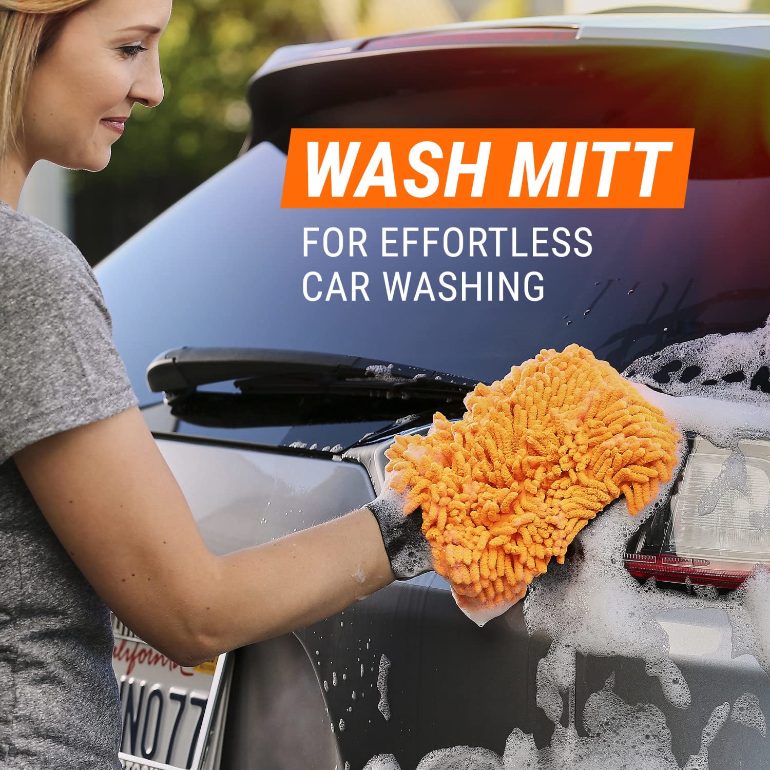 Armor All mitt on hand wet with suds demonstrating secure fit and control