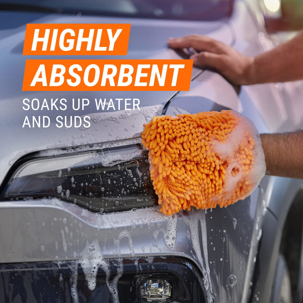 Armor All mitt cleaning a wheel showing safe grime removal from metal surfaces