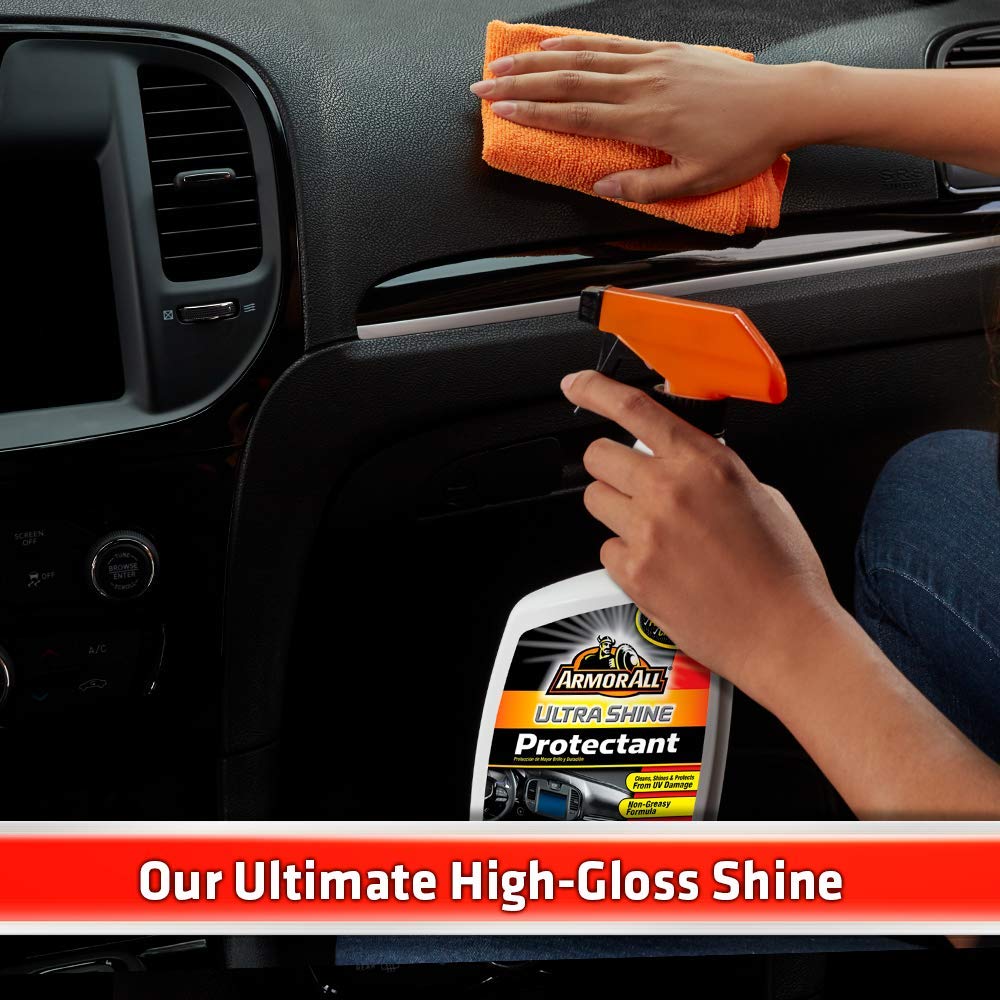 Armor All bottle held in hands to show 16 fl oz size and convenient portability