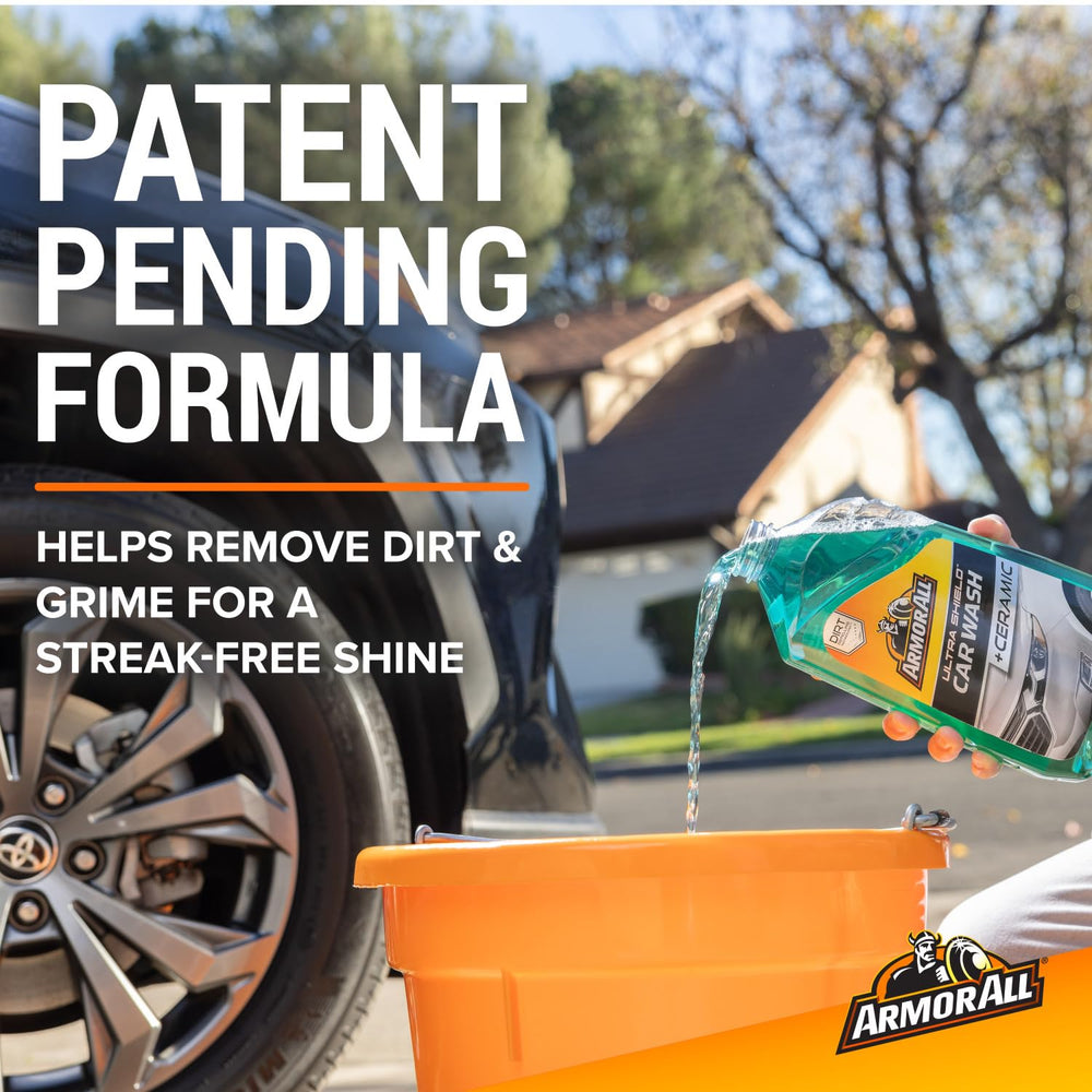 Armor All rich suds on car panel showing gentle lift of dirt and safe wash action