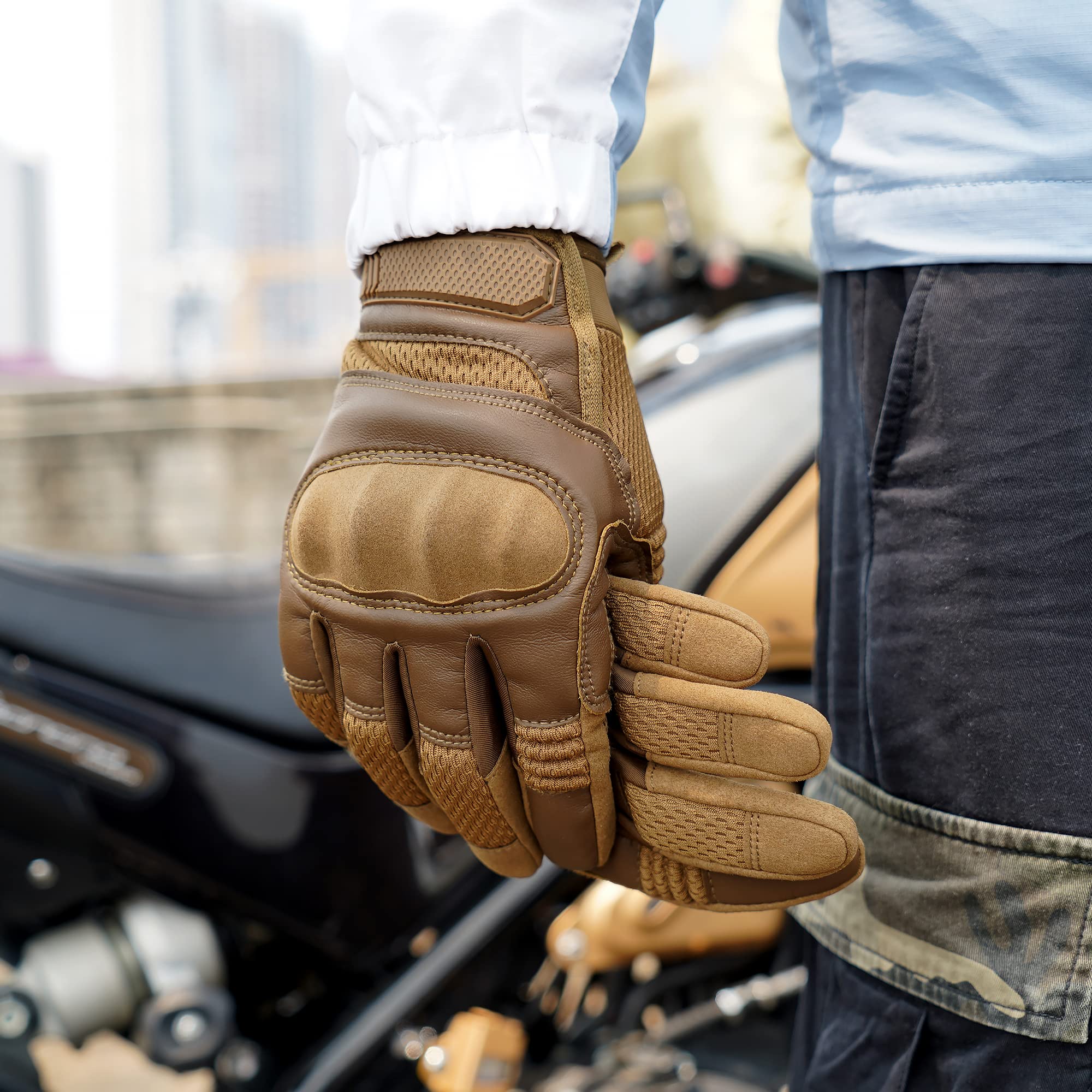 AXBXCX lifestyle shot at work showing gloves providing protection and touchscreen access