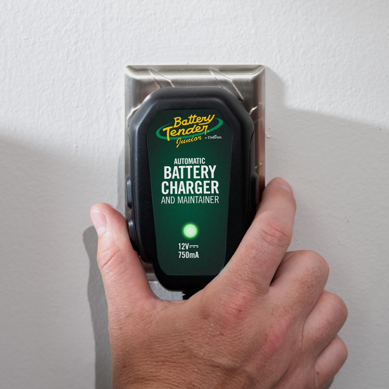 Battery Tender connected to a motorcycle battery demonstrating safe maintenance