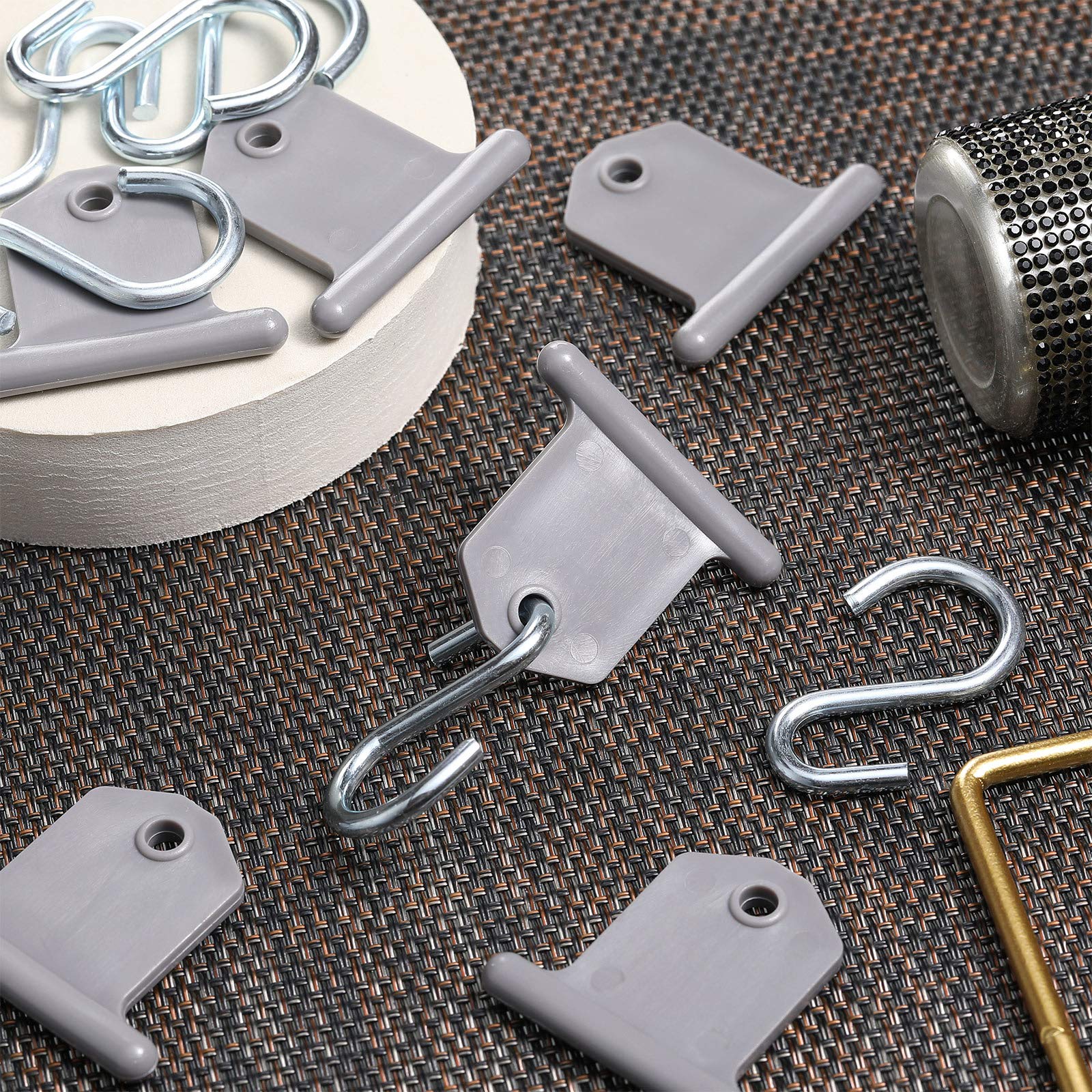 BBTO hooks next to a coin showing size and space-saving benefit