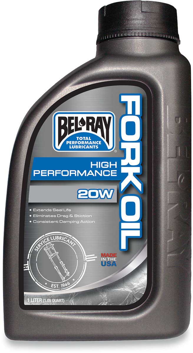 Bel-Ray close-up of oil being poured into fork tube demonstrating smooth flow and reduced friction