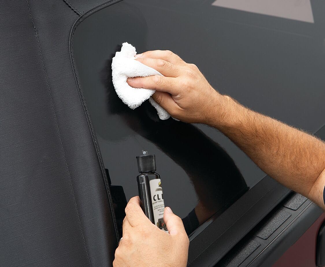 Bestop cleaner in use wiping Jeep vinyl window for clearer view