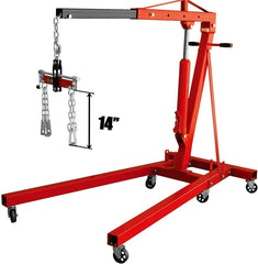 BIG RED Torin mounted on an engine demonstrating balanced lifting and safer positioning