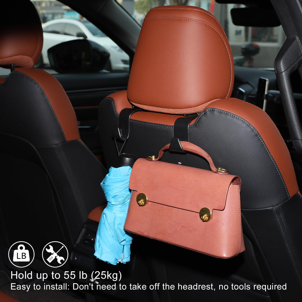 Birbenben headrest hooks in use holding a handbag and freeing seat space