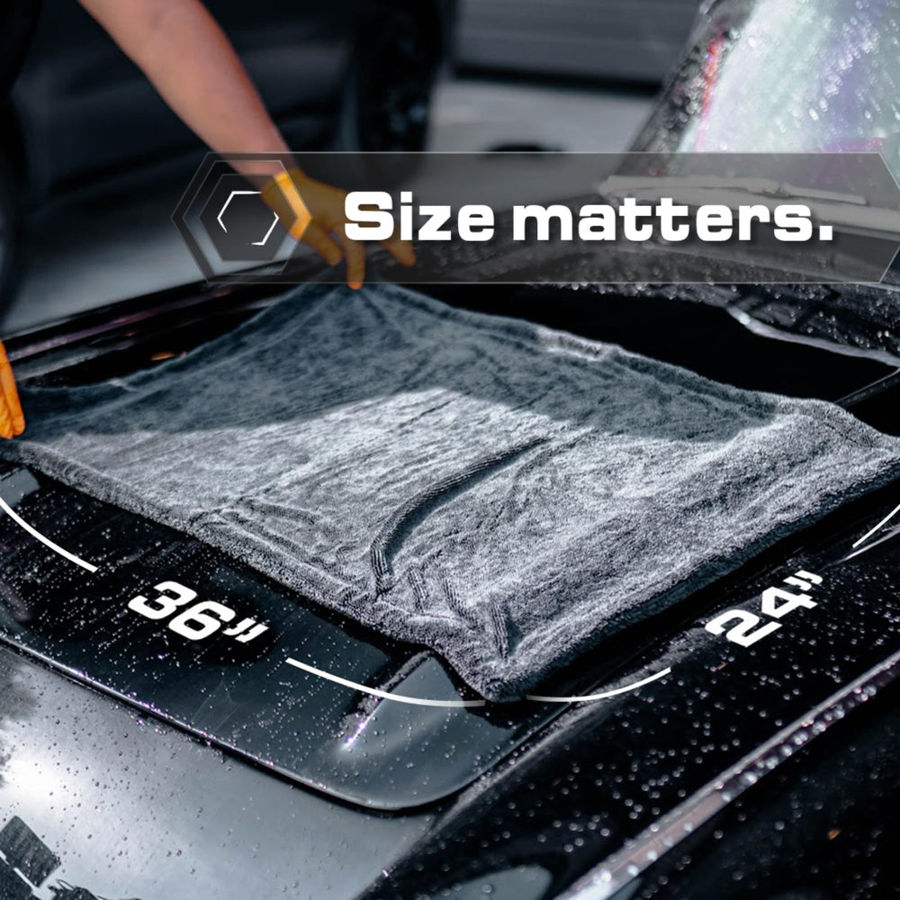 Blackline towel drying a car hood with no streaks, showing quick finish