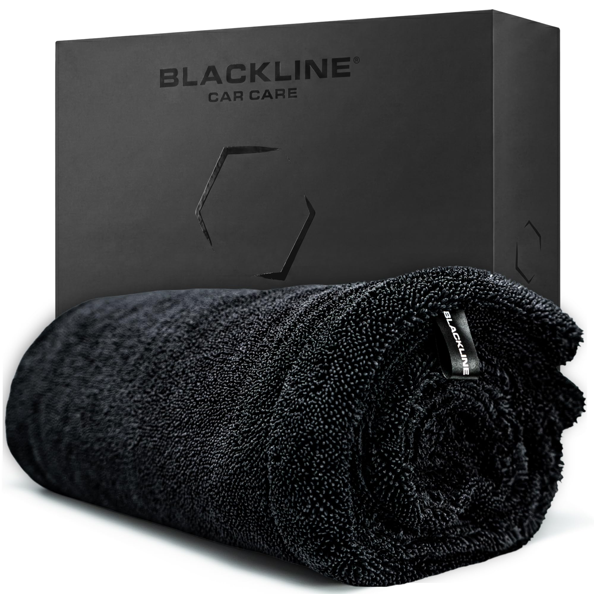 Blackline front view of towel folded showing size and label, clear sizing benefit