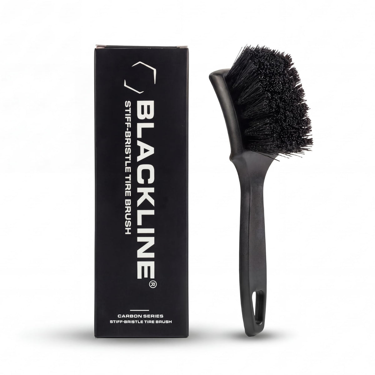 Blackline front view of brush showing shape and grip for comfortable handling