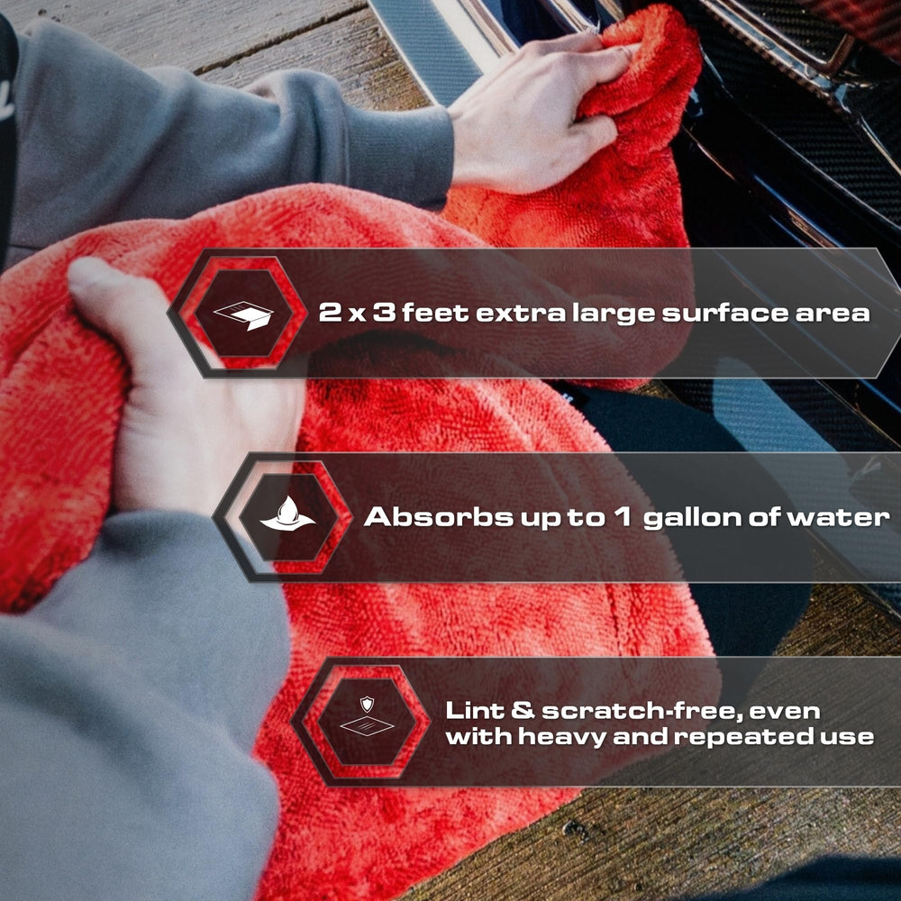 Blackline towel being dragged across car hood for fast, streak-free drying