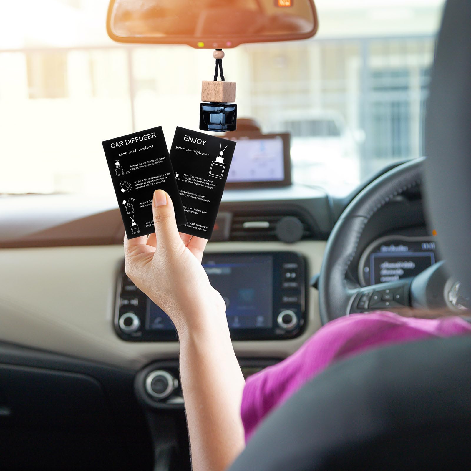 Boao hanging bottle suspended from rearview mirror showing hands-free fragrance