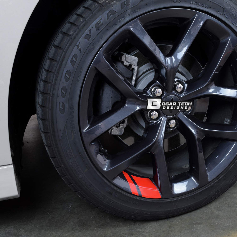 BOGAR TECH DESIGNS decal installed on wheel showing precise red accent for visual impact