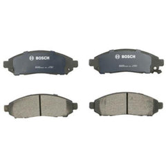 Close-up of Bosch QuietCast BC1094 pad shim and ceramic surface highlighting noise reduction