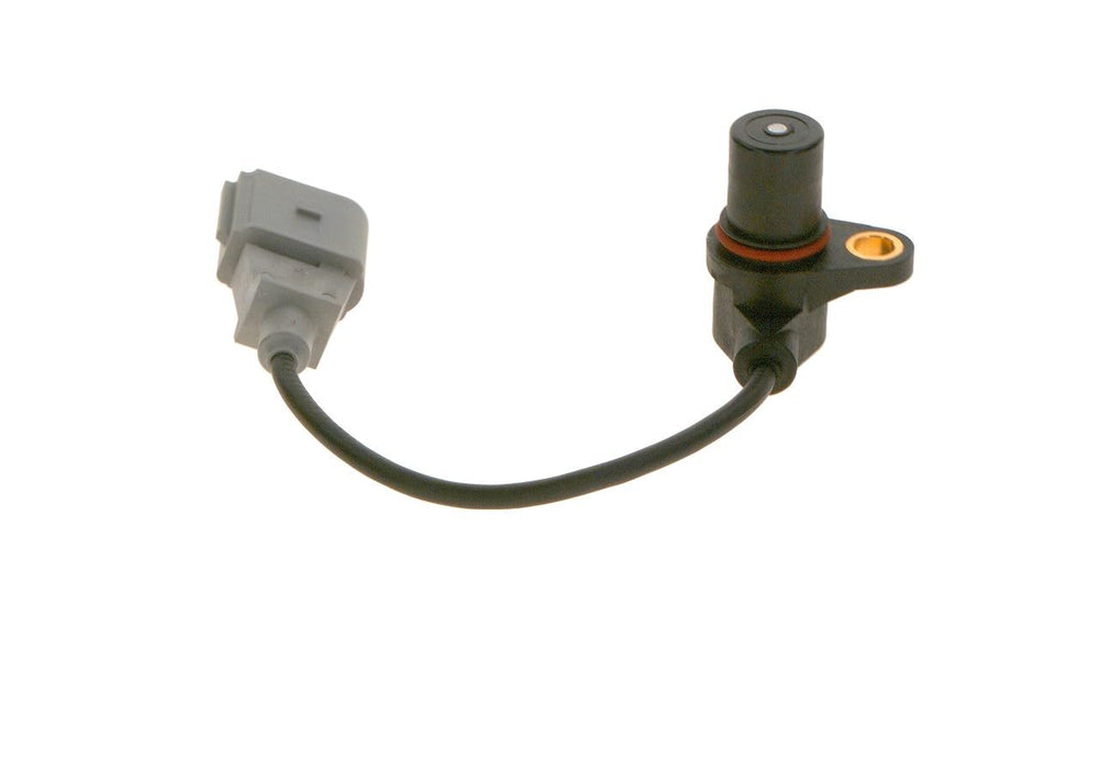 Bosch sensor held in hand to show scale and ease of handling during replacement