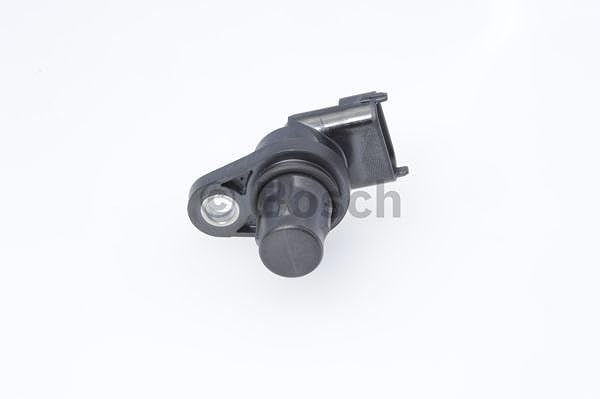Bosch camshaft sensor beside ruler showing exact-fit dimensions for accurate swap