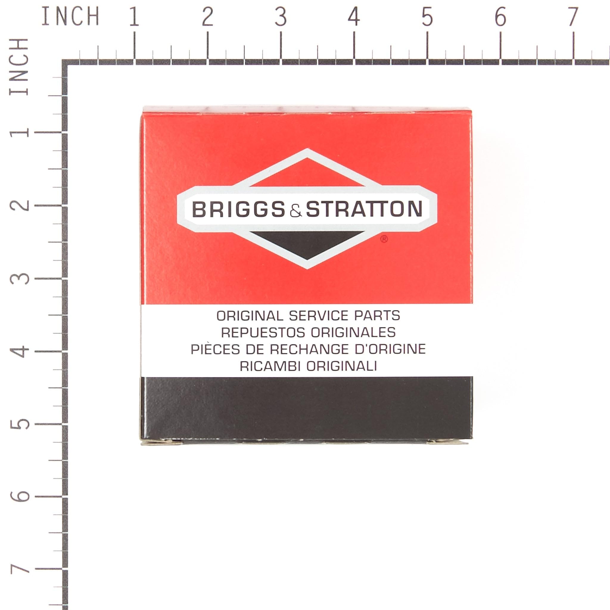 Briggs & Stratton carburetor with ruler for size and fit confirmation
