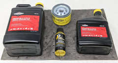 Briggs & Stratton oil bottles close-up displaying clear dosing markings