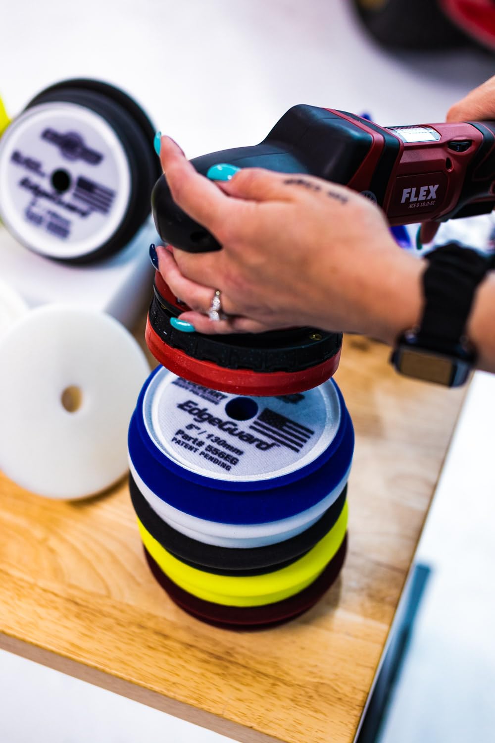 Buff and Shine pad mounted on an orbital polisher demonstrating controlled correction