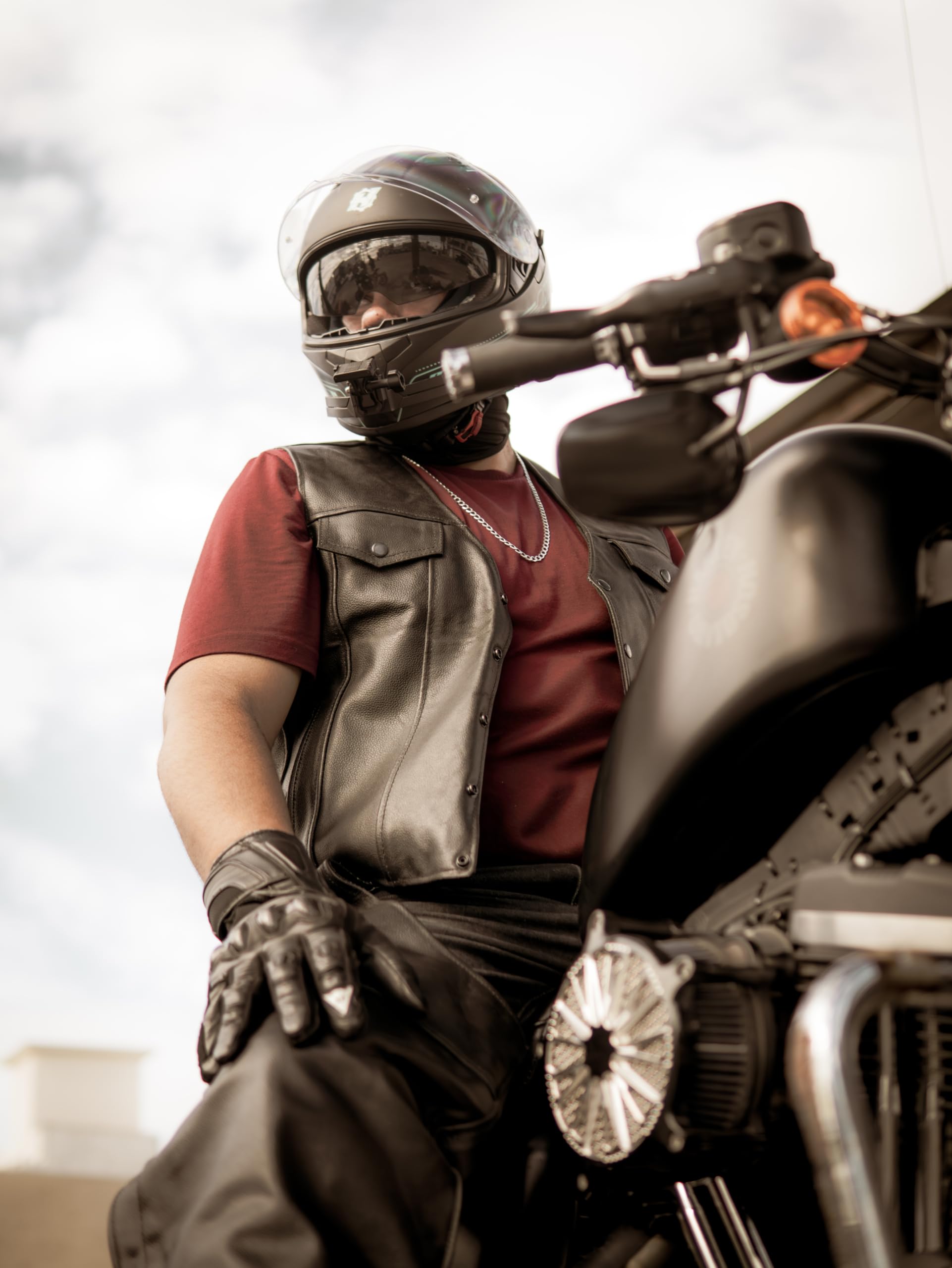 BYKR vest worn by rider on motorcycle demonstrating functional riding fit