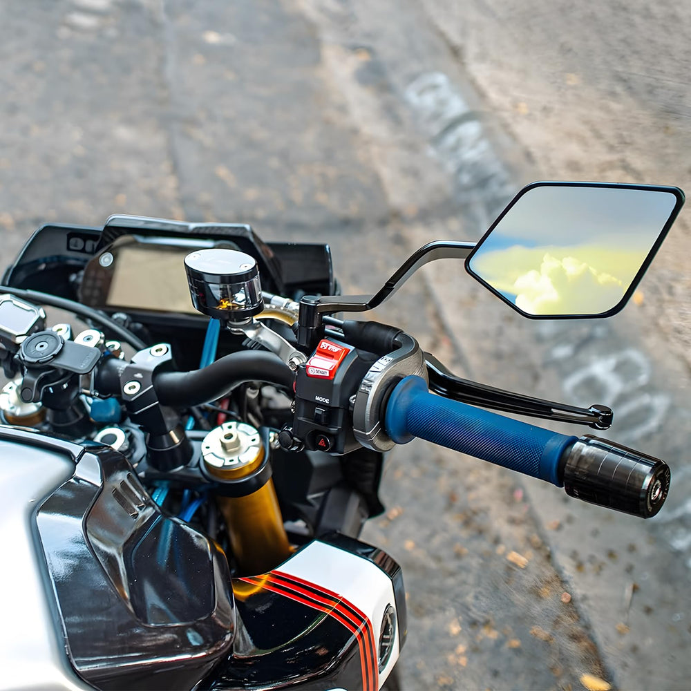 Caboriallan mirror next to hand to show compact size and lightweight balance