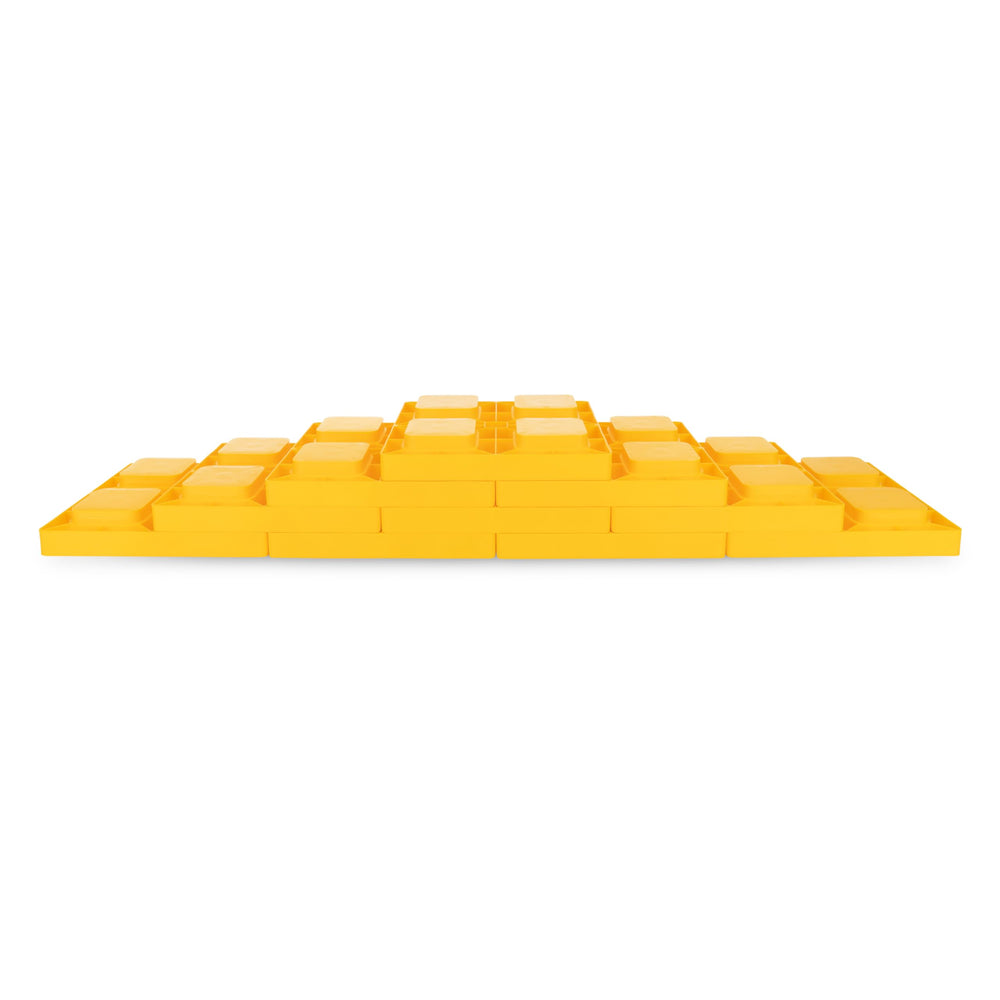 Camco leveling blocks in campsite scene enabling level, comfortable setup
