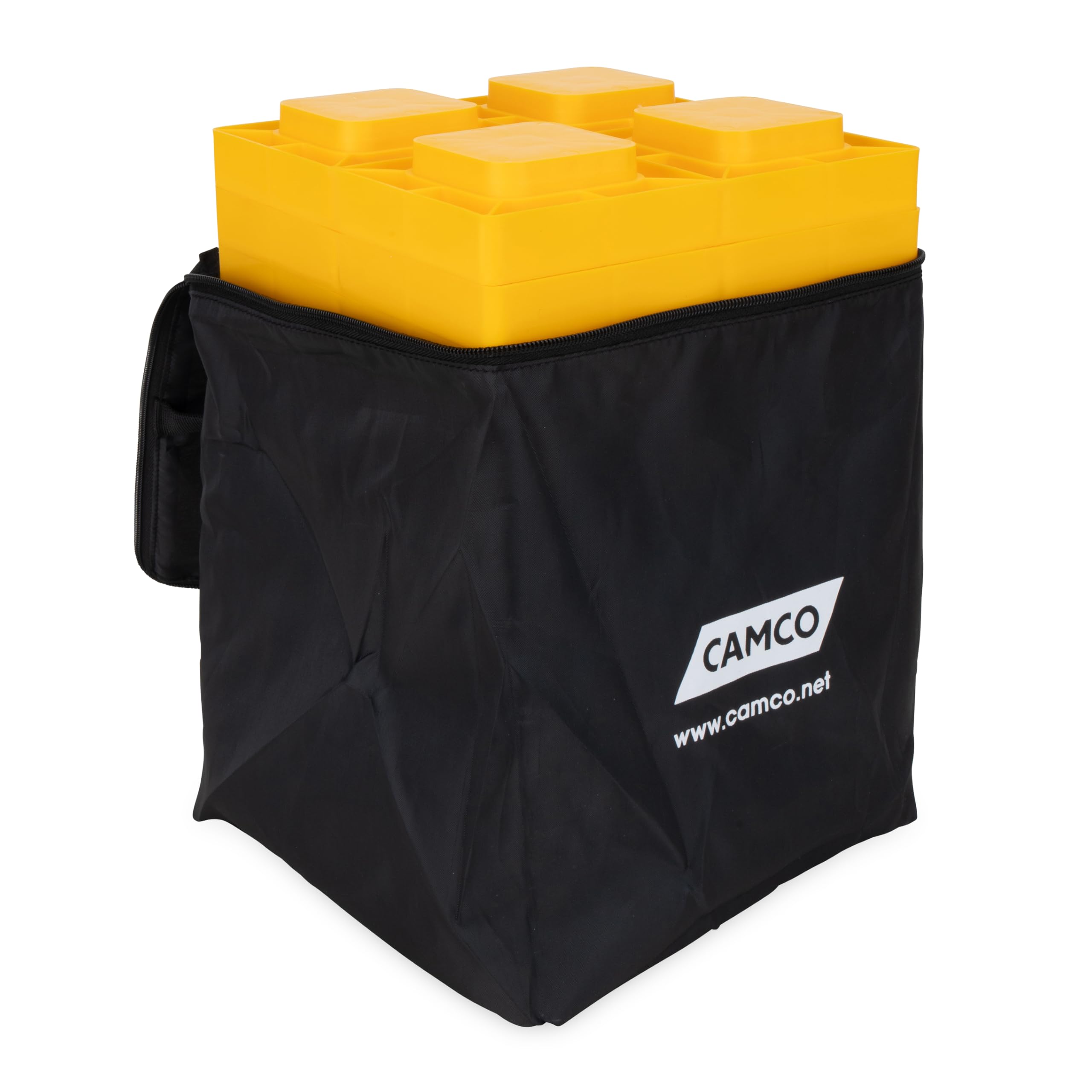 Camco block next to ruler showing 1 inch increment for precise leveling