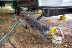 Camco Rhino installed at full 10-inch elevation clearing an obstacle for proper flow