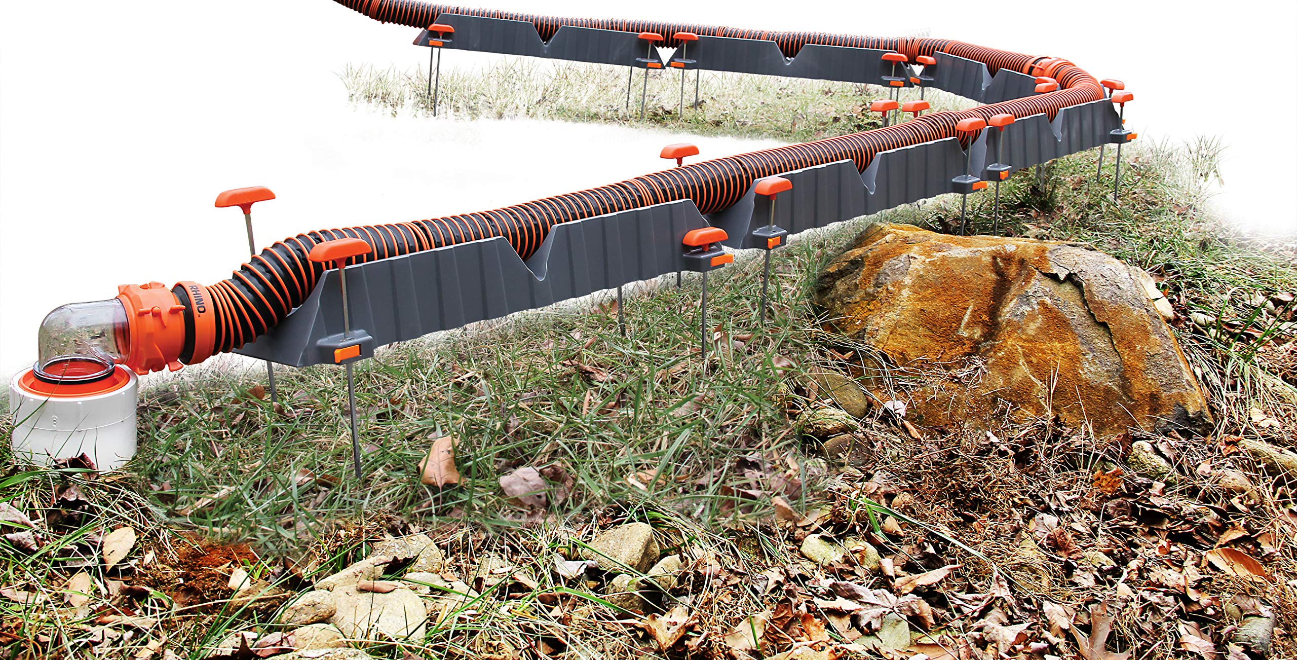Camco Rhino supporting hose as it goes over a curb to prevent kinks and blockages
