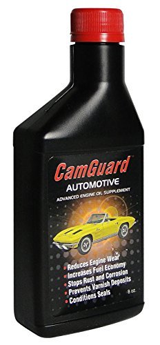 Pouring CamGuard concentrate into an engine oil filler to show easy application