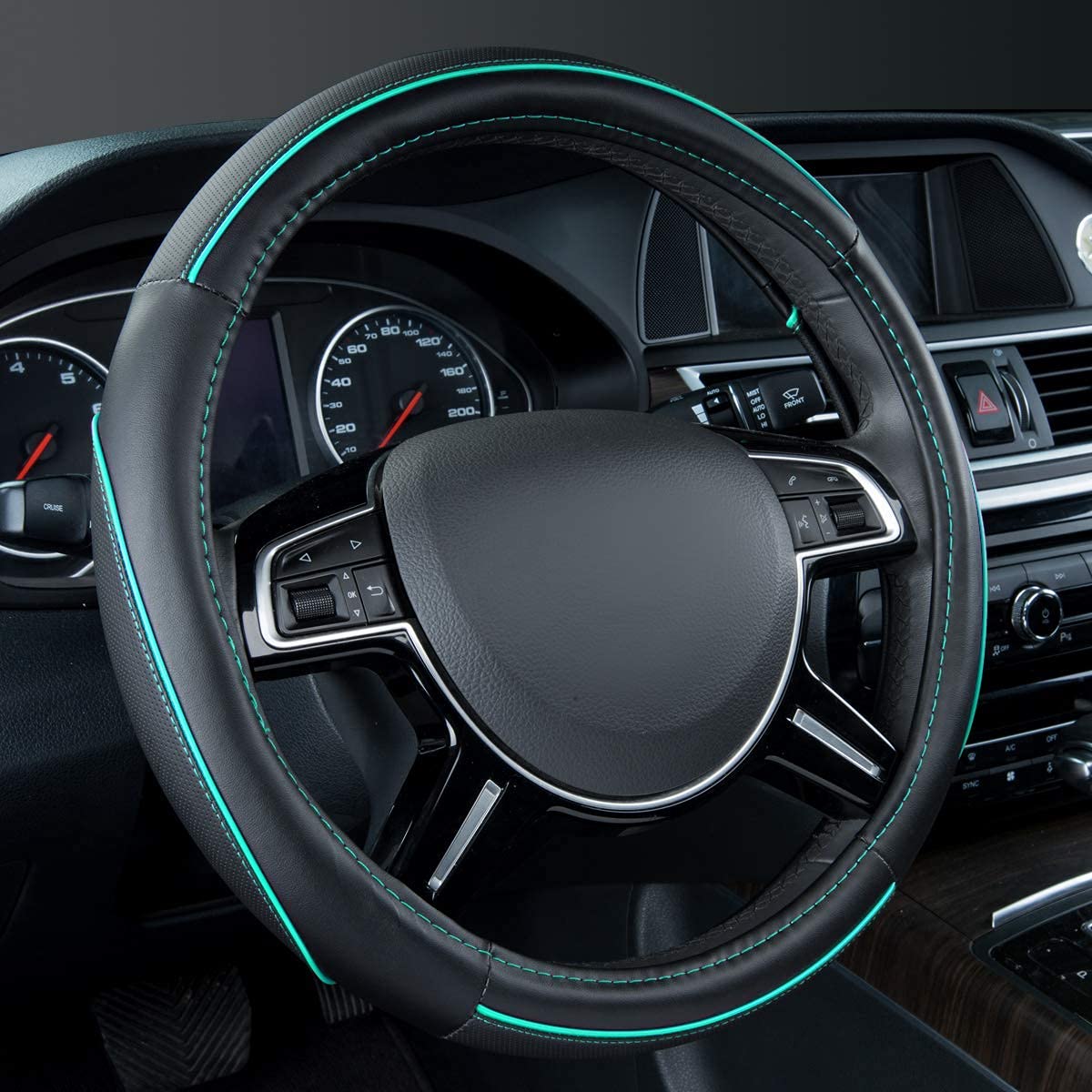 CAR PASS front view of black and mint steering wheel cover showing sporty look and style