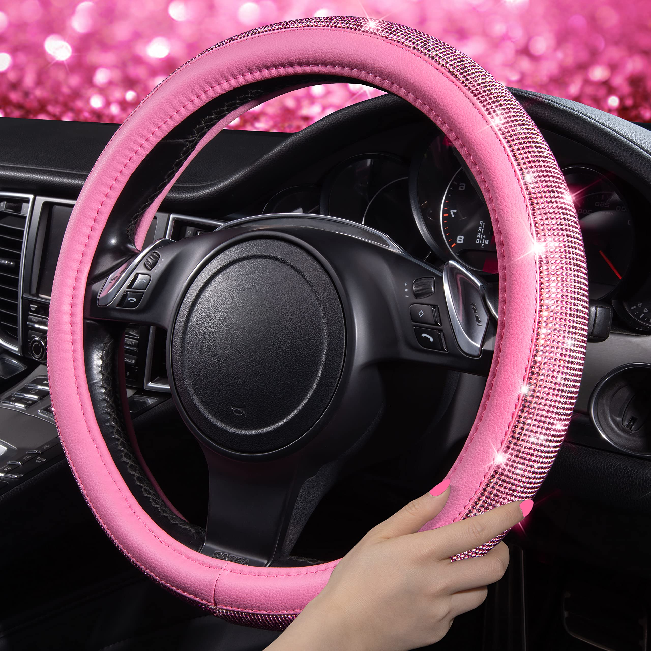 CAR PASS steering wheel closeup displaying rhinestones and improved grip.