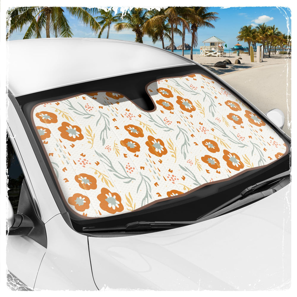Carbella laid across dashboard to show 57 by 27 inch size and coverage benefit