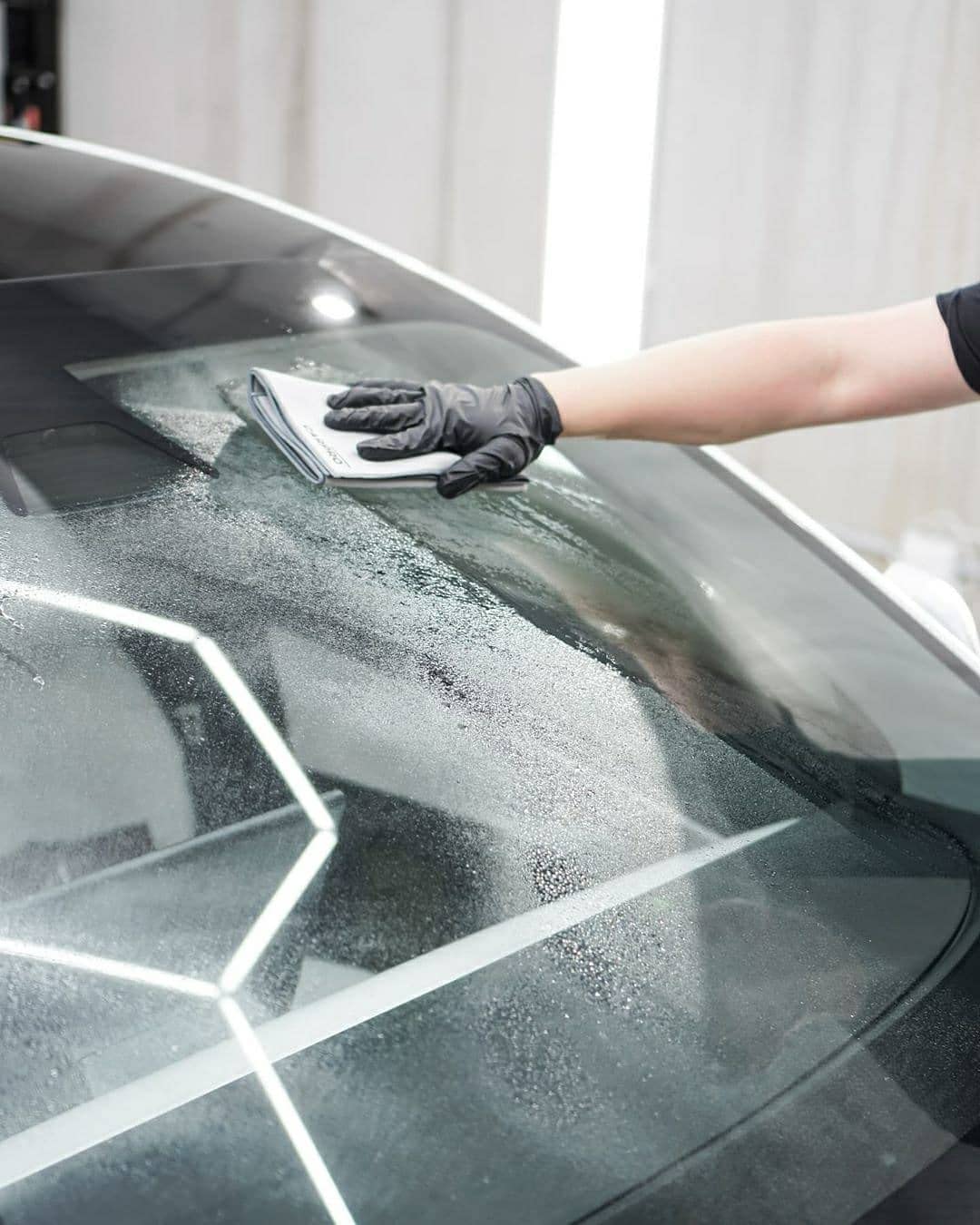CARPRO Clarify next to a 500ml comparison object, shows travel-friendly size benefit