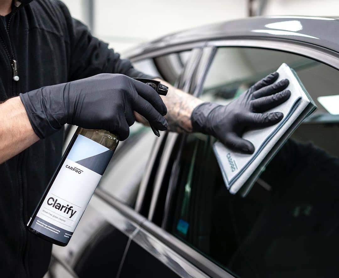 CARPRO Clarify being sprayed onto glass, fast cleaning action demonstrated