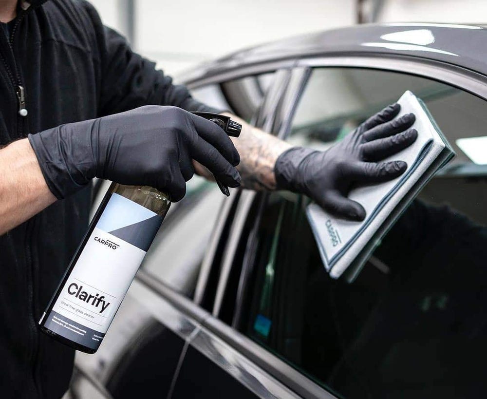 CARPRO Clarify being sprayed onto glass, fast cleaning action demonstrated