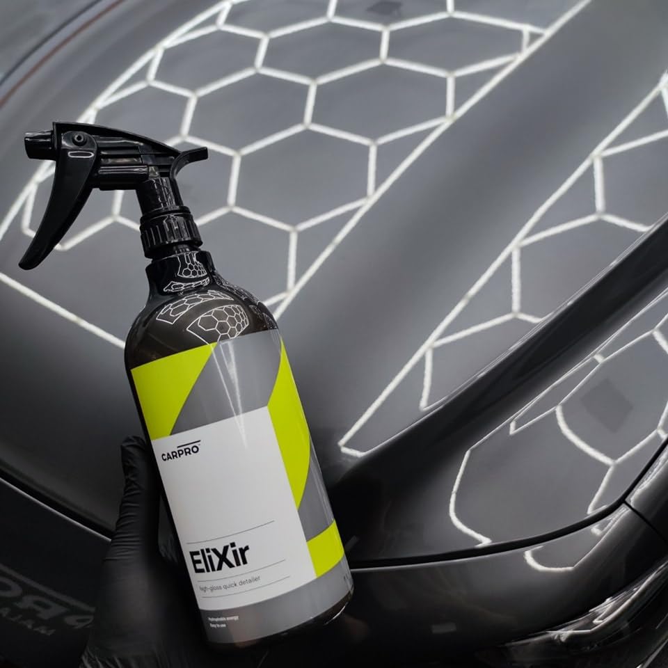 CARPRO EliXir high-gloss paint close-up reflecting surroundings for depth