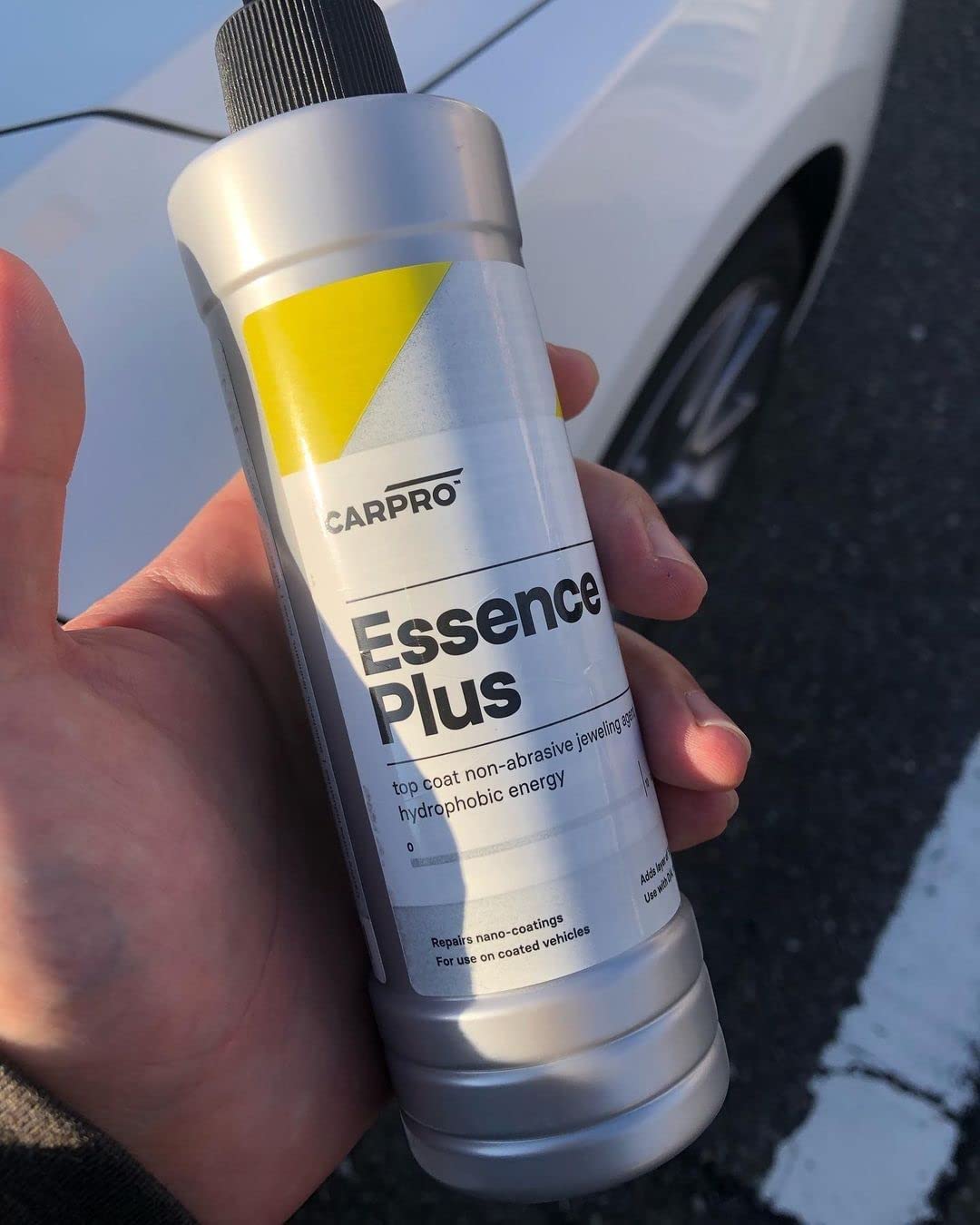 Close-up of CARPRO Essence PLUS texture indicating smooth spreadability