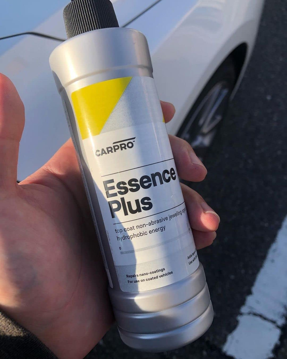 Close-up of CARPRO Essence PLUS texture indicating smooth spreadability