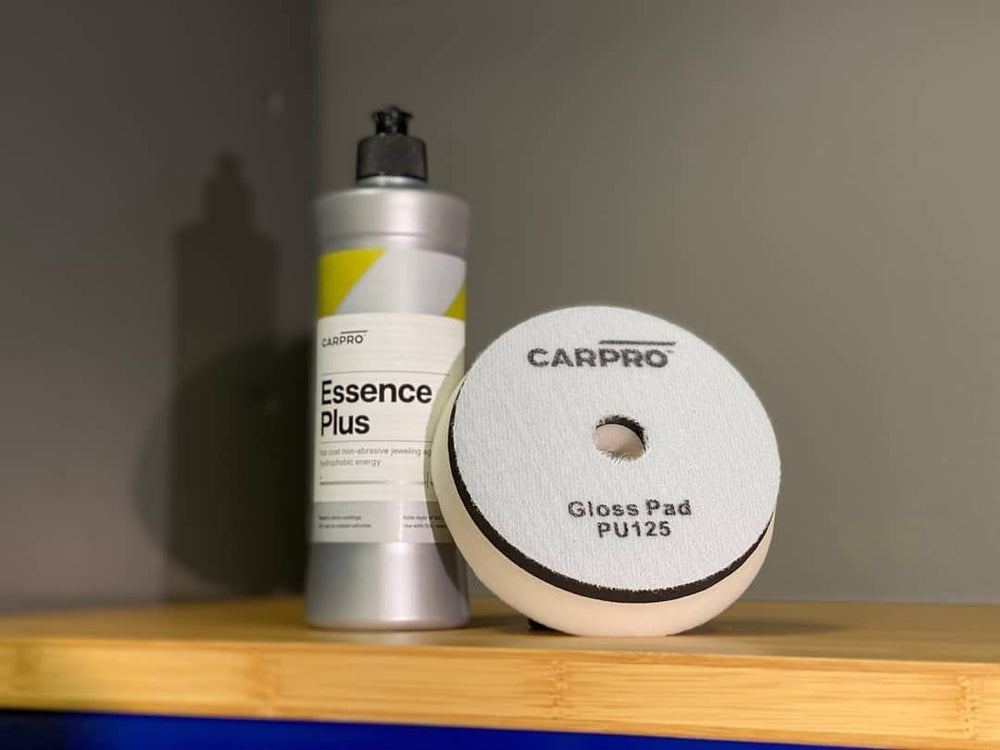 Dual-action polisher applying CARPRO Essence PLUS for even coverage